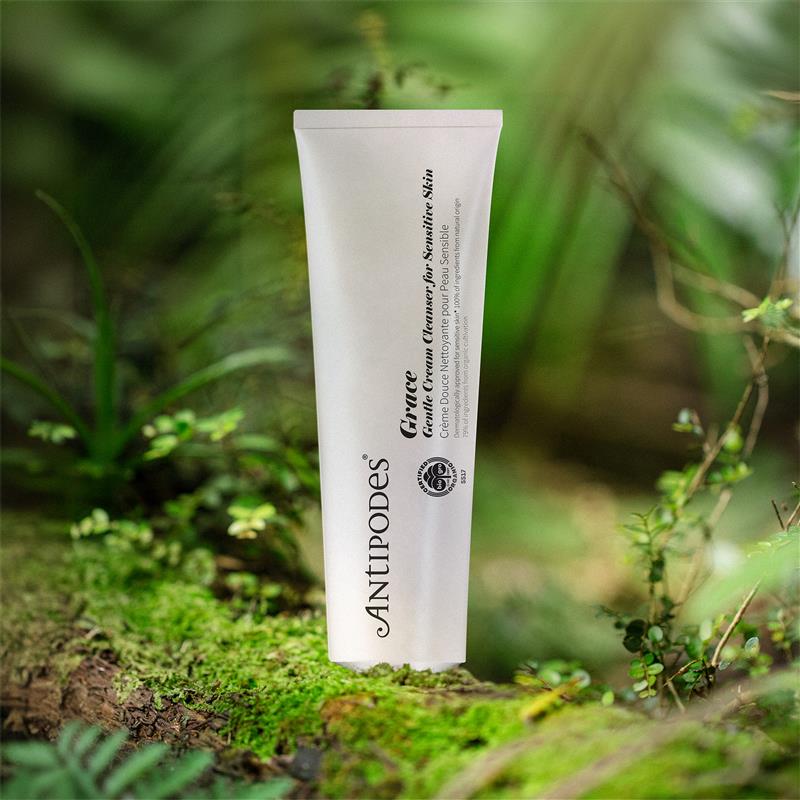 Tube of Antipodes Grace Cleanser product on a natural background