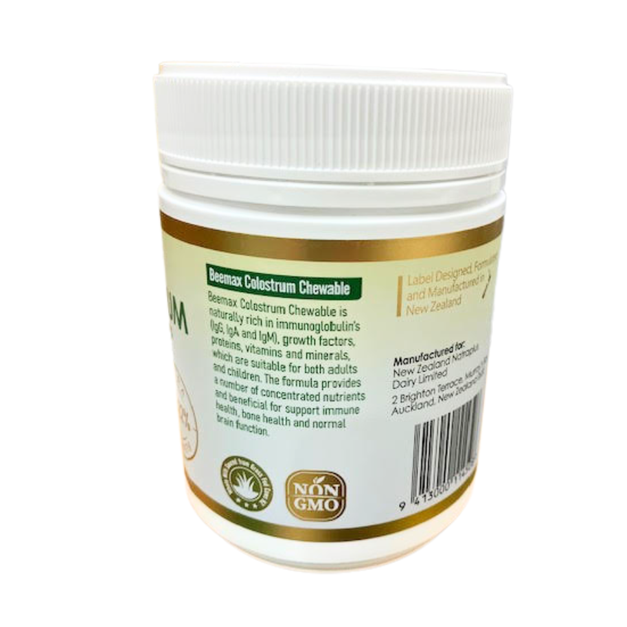 BeeMax Colostrum Supplement jar with label on a white background