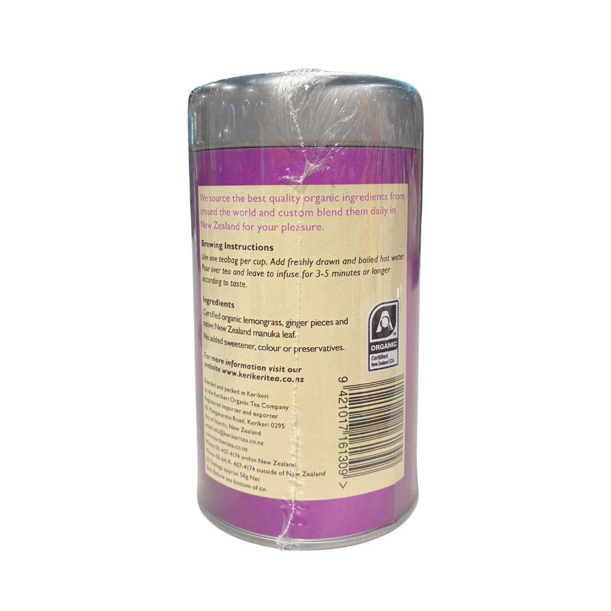 The back of a cylindrical glass bottle wrapped in clear plastic, showing a purple label with product information, a barcode, and a small A4 certification logo, on a white background.