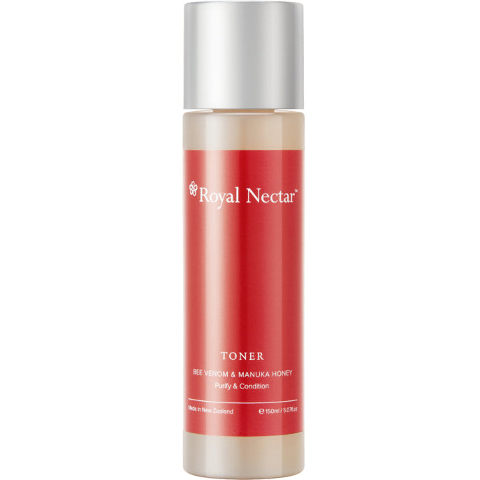 A bottle of Royal Nectar Bee Venom Toner with a red label and a clear cap, containing 100ml of the product.