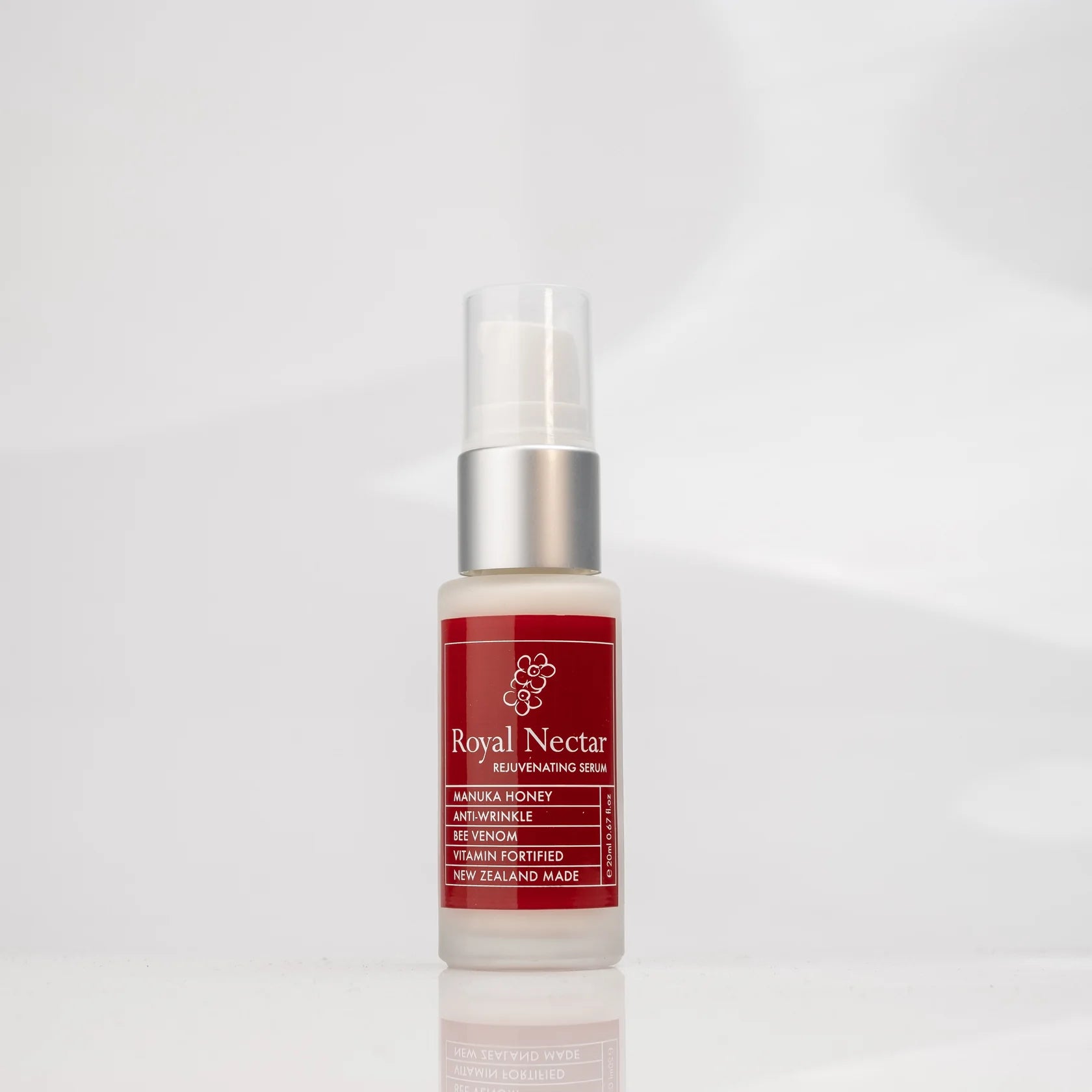 Royal Nectar Vee Venom Rejuvenating serum bottle with red label on a white background