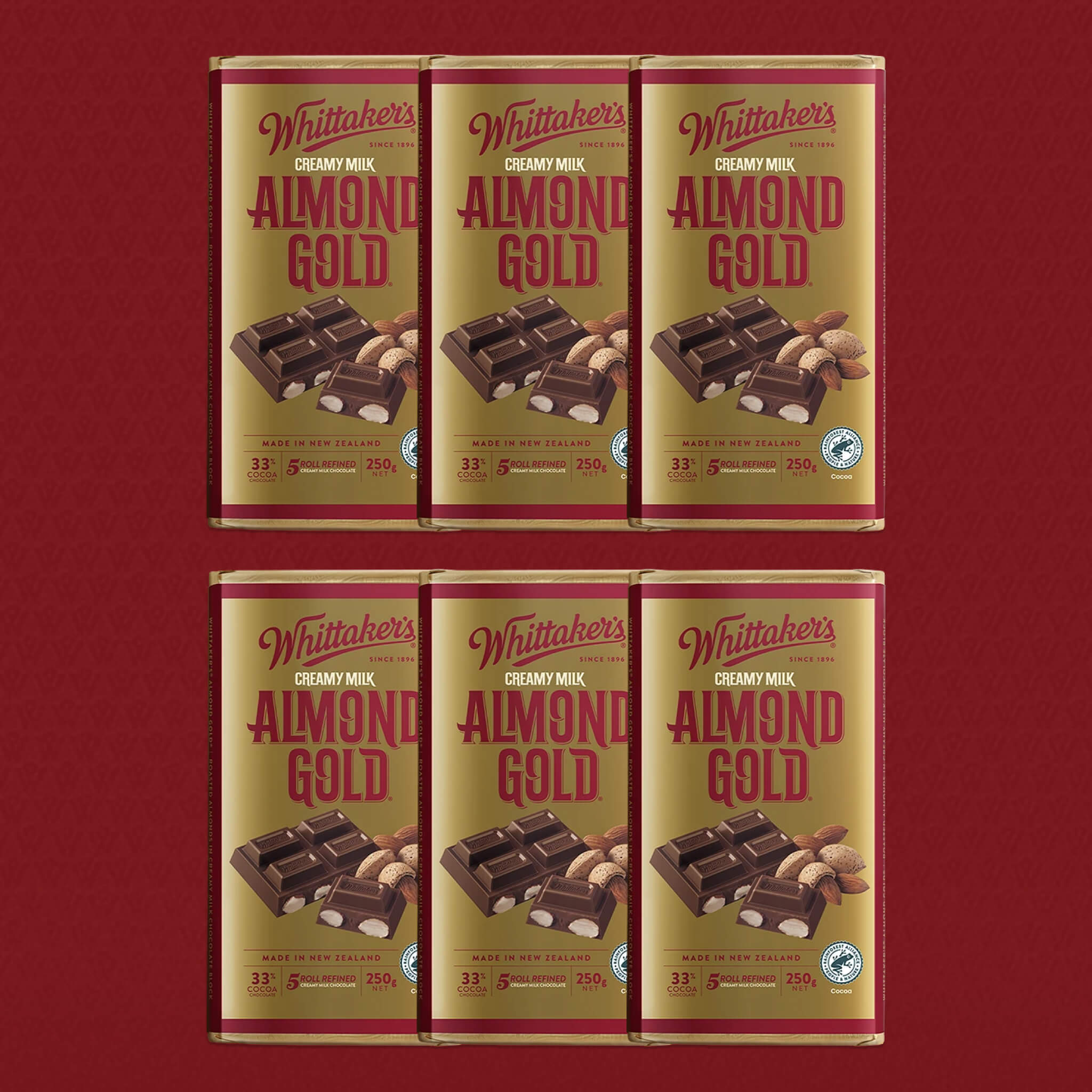 Whittaker’s Almond Gold 6PK on red background