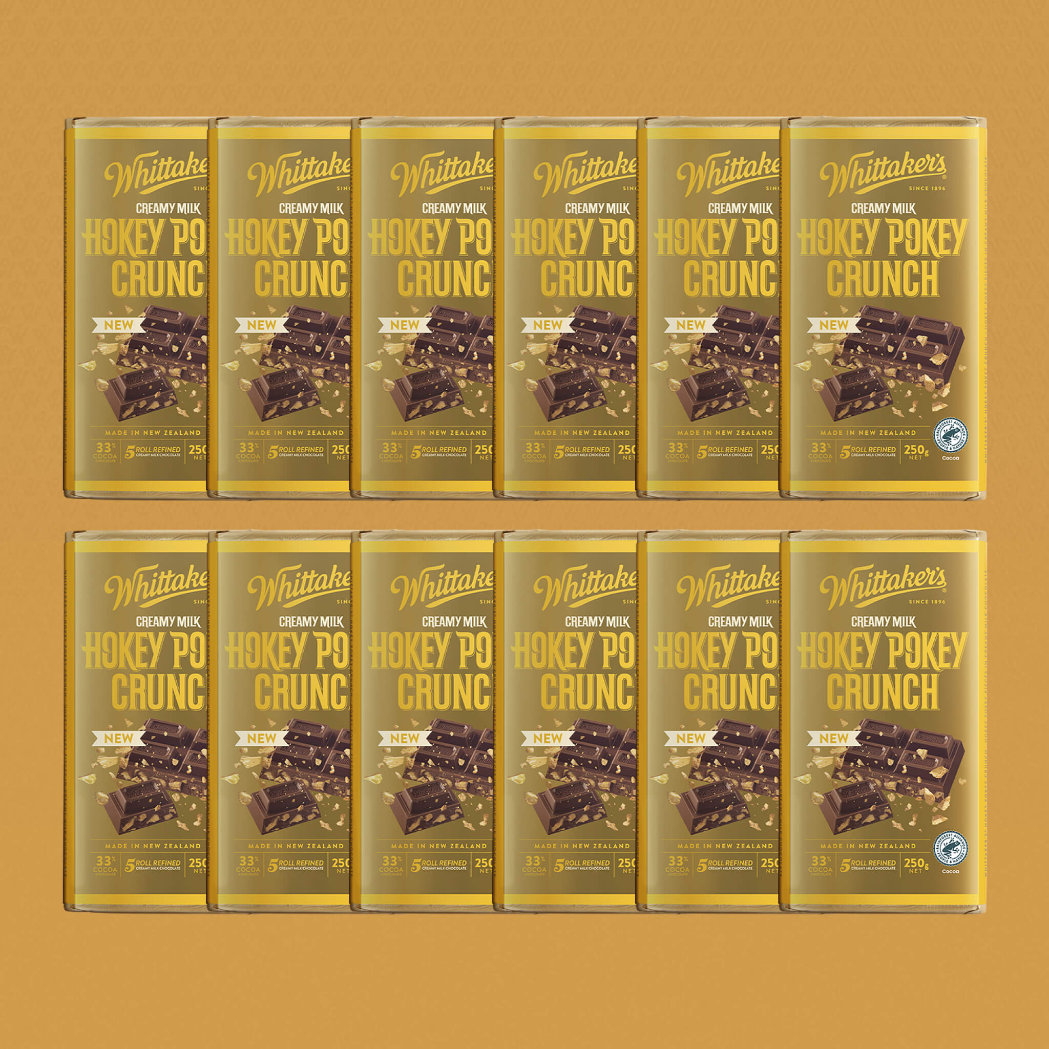 12 blocks of Whittaker's Honey Pokey Crunch chocolatee block on a yellow background