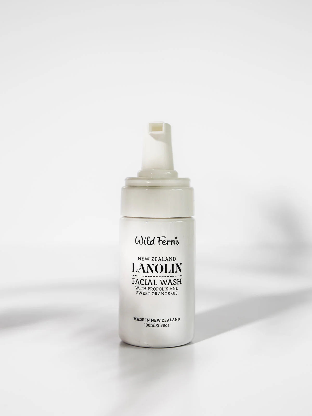 White bottle of Wild Ferns Lanolin Facial Wash on a white background