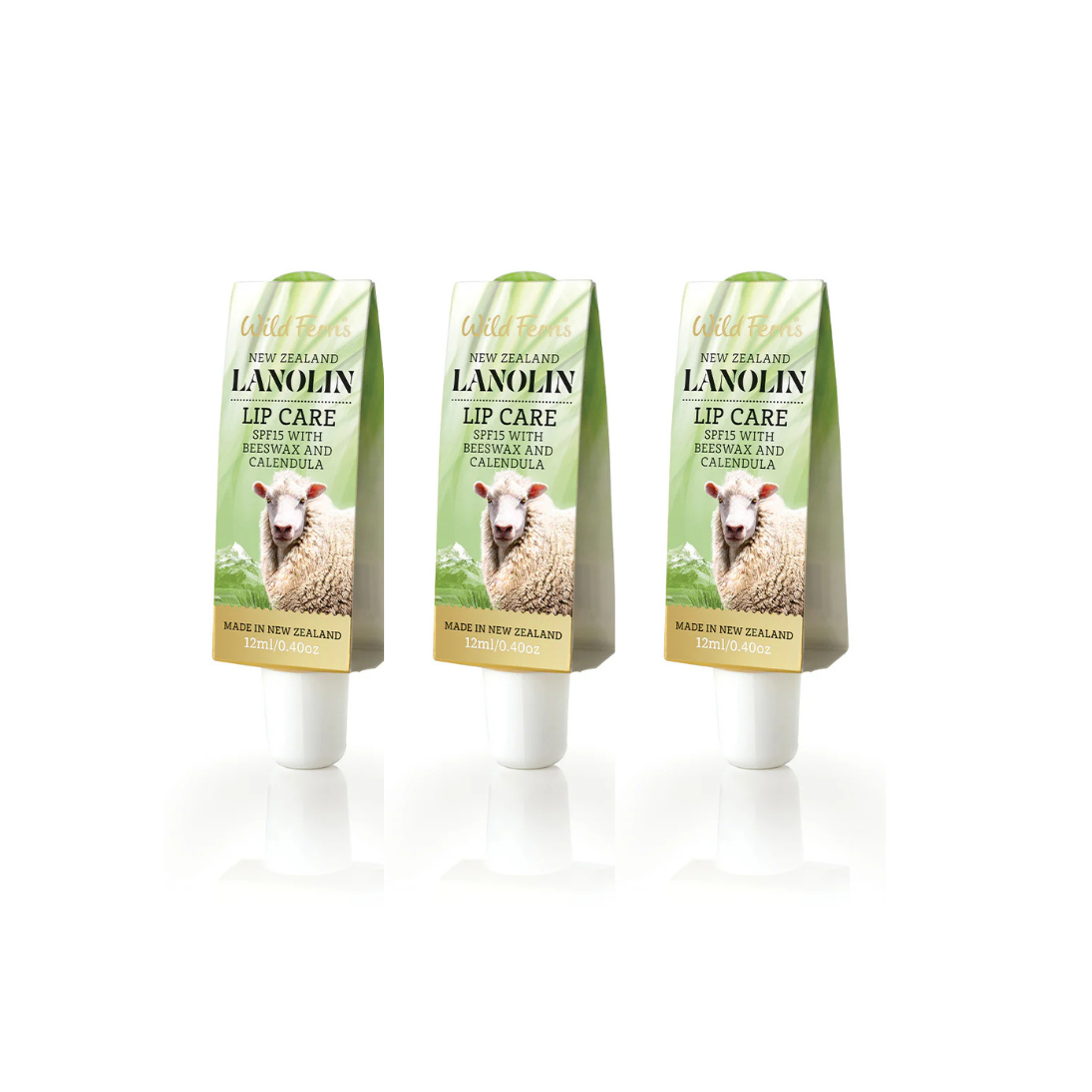 Three tubes of New Zealand Lanolin Wild Fern's lip care with sheep illustration on a white background