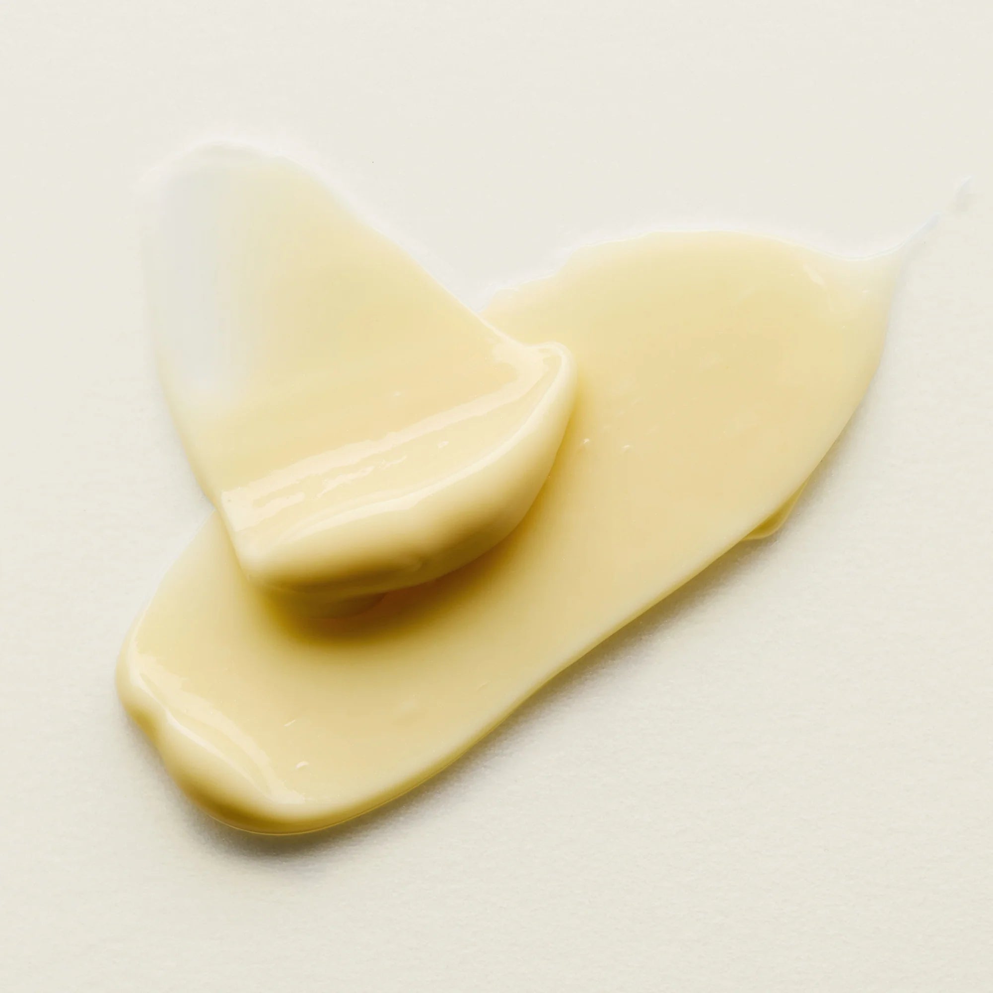 Antipodes Aura cream spread on a white surface