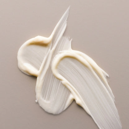 Antipodes Avocado Pear Night Cream white cream on a beige background