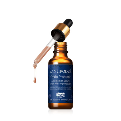 A bottle of Antipodes Credo Probiotic Anti-Blemish Serum with a dropper, against a white background.