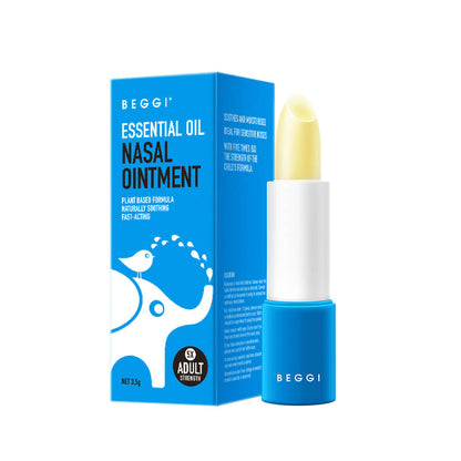 BEGGI essential oil nasal ointment with blue packaging and white applicator on a white background