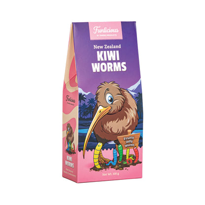 A 100 g bag of Funicious Kiwi Worms on a plain white background. The packaging features a purple top section and a pink bottom, decorated with an illustration of a kiwi bird and colorful cartoon worms.