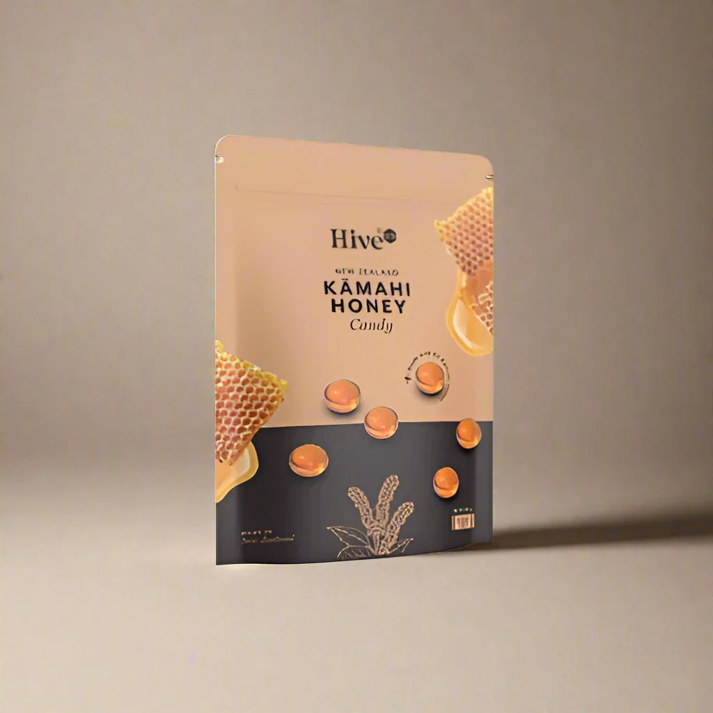 Hive Kamahi Honey Candy packaging on a gray background