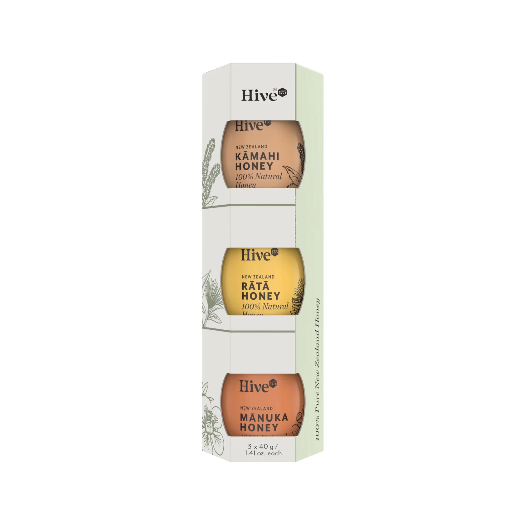 A boxed set of three Hive brand honey jars in a tall, narrow hexagonal package. The package is white and pale green, showing amber-colored honey through oval windows labeled Kamahi Honey, Bata Honey, and Manuka Honey.