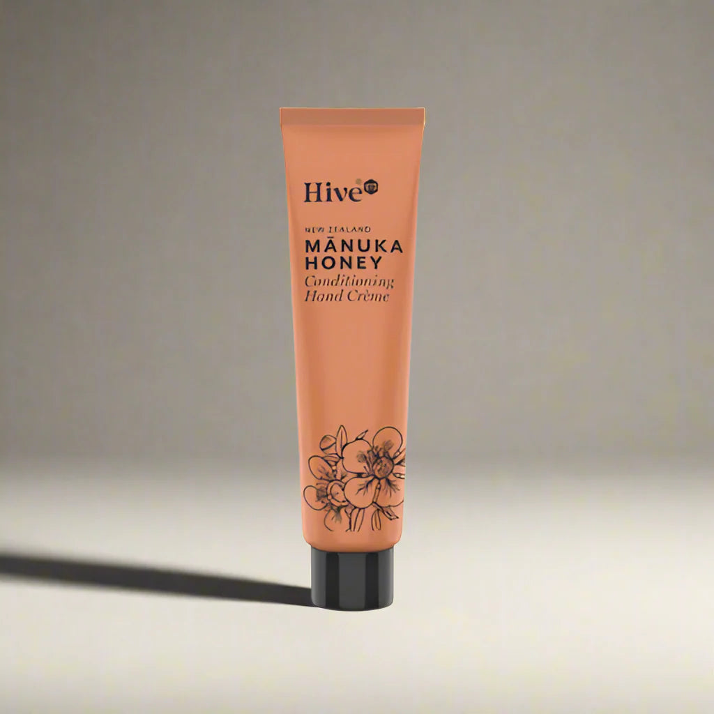 Tube of Hive Manuka Honey Conditioning Hand Creme on a gradient background