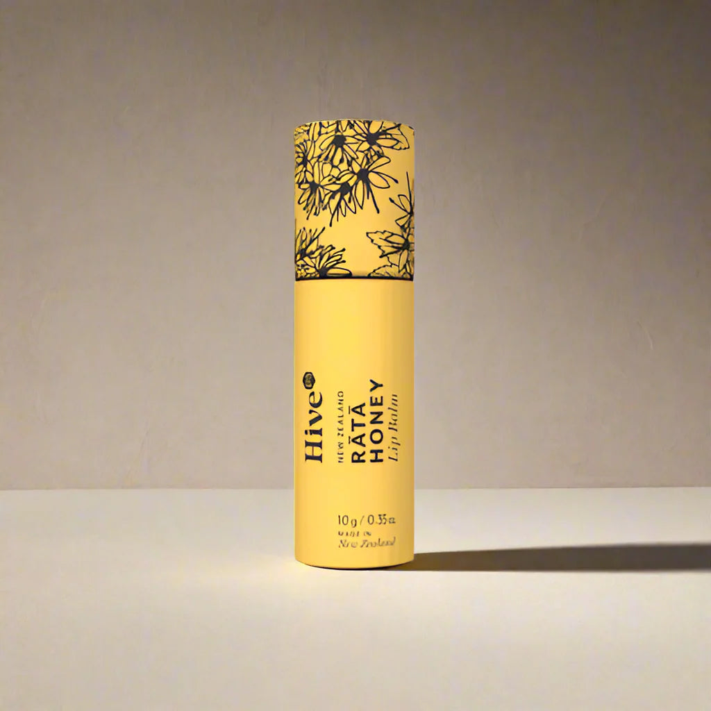 Hive rata honey lip bal on white surface