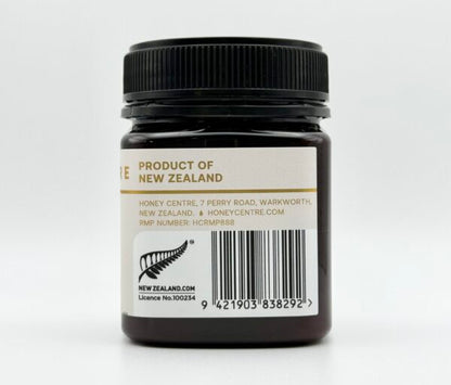 Jar of Honey Centre honey labeled 'Product of New Zealand' on a white background