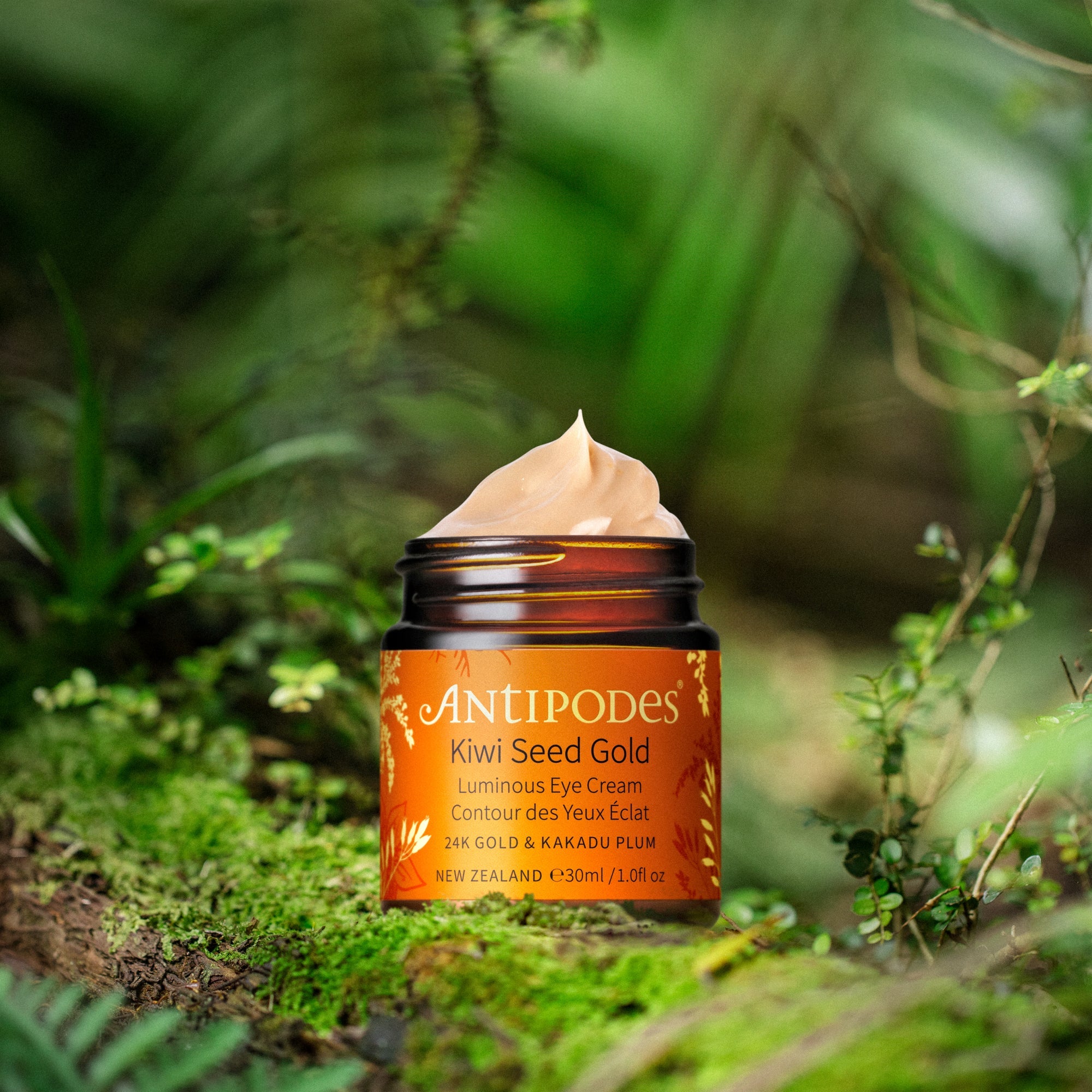 Antipodes Kiwi Seed Gold Luminous Eye Cream jar on a natural background