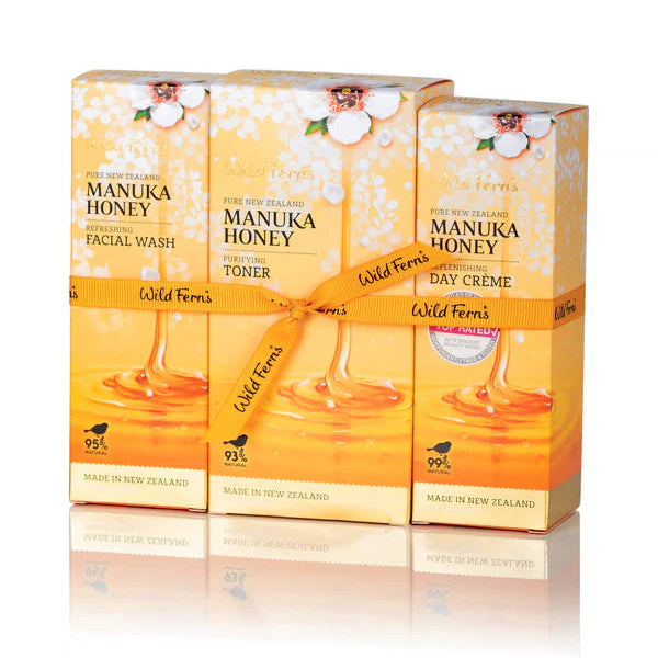 Three boxes of Manuka Honey skincare products from Wild Ferns on a white background