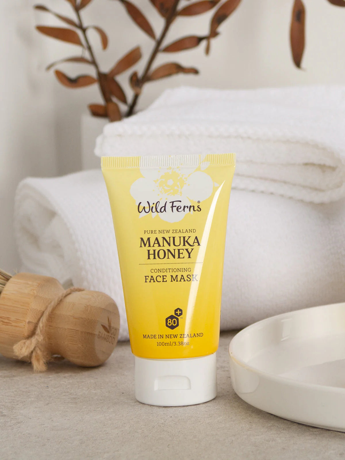 Manuka Honey Face Mask tube by Wild Ferns on a neutral background