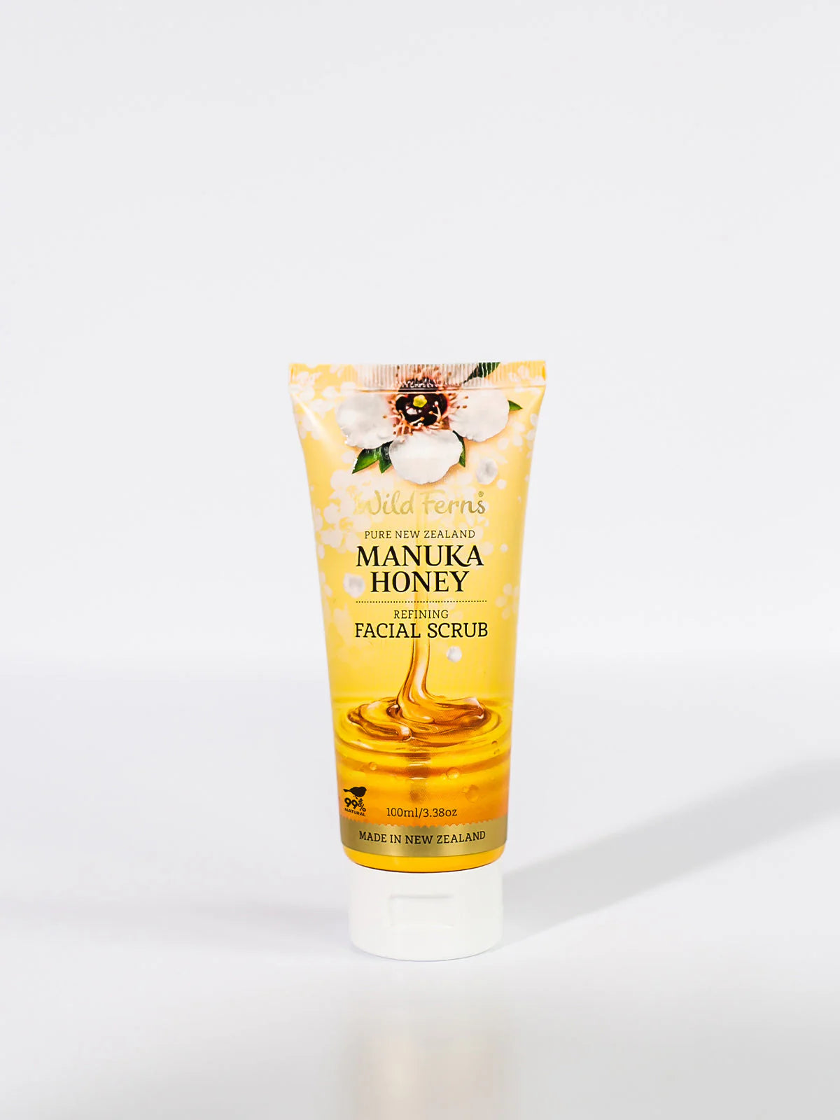 Tube of Wild Fern's Manuka Honey facial scrub on a white background