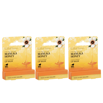 Three packages of Wild Ferns Manuka Honey lip balm on a white background