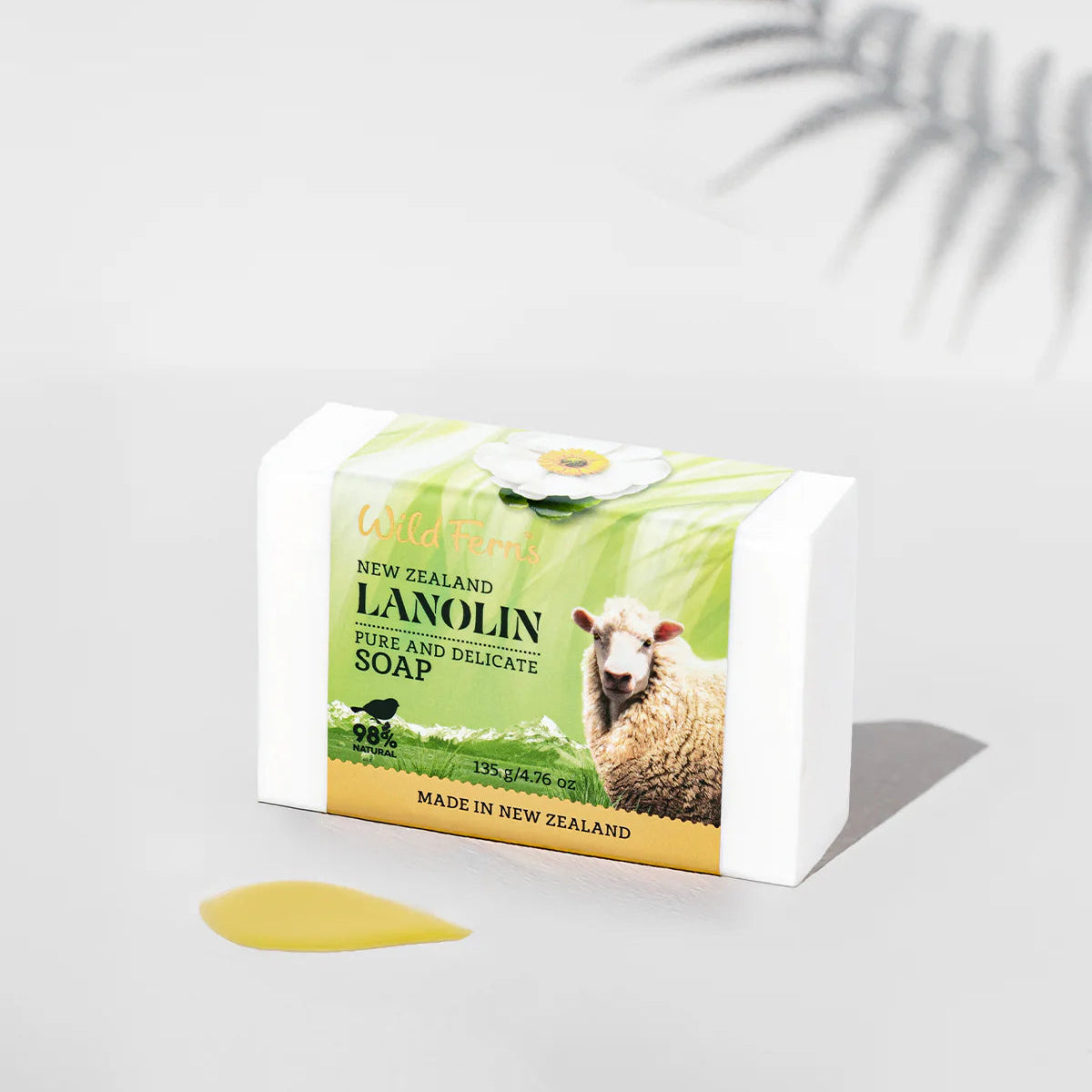 Bar of New Zealand Wild Fern's Lanolin soap with a sheep illustration on a white background