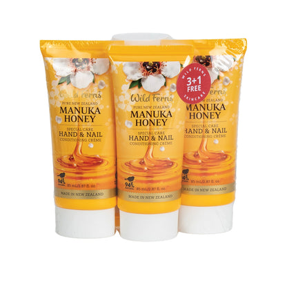 Three bottles of Wild Ferns Manuka Honey hand and nail cream on a white background