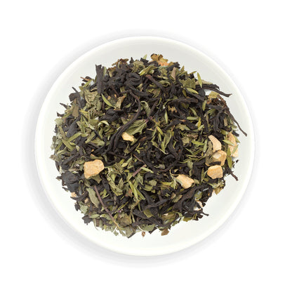 Zealong Tea Dry tea leaves in a white bowl on a white background