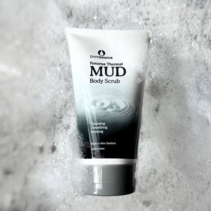 Tube of puresource Rotorua Thermal Mud Body Scrub on a textured gray background